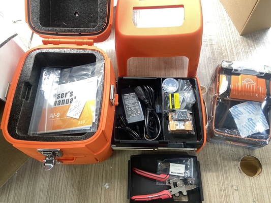 AI-9 6 Motos Splicer di fusione multilingue attrezzature in fibra ottica Splicer automatico di fusione Splicer di fusione in fibra ottica